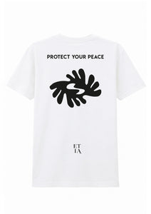 White t-shirt with black graphic and text on a white background