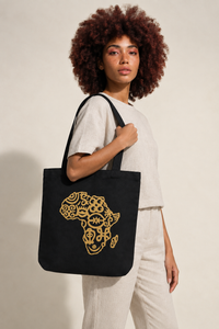 Adinkra tote carried by a model